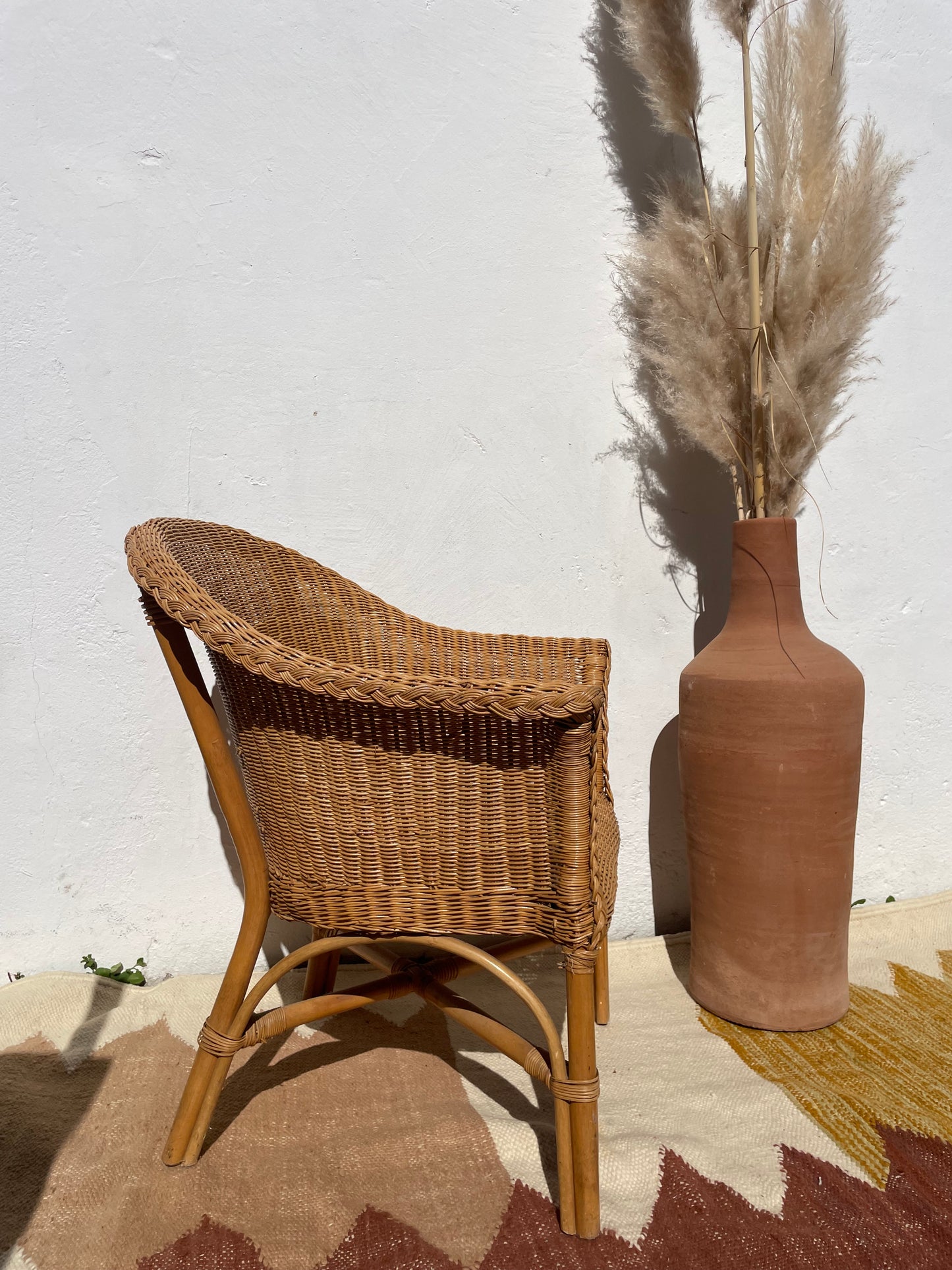 Fauteuil vintage en rotin tressé – esprit bohème