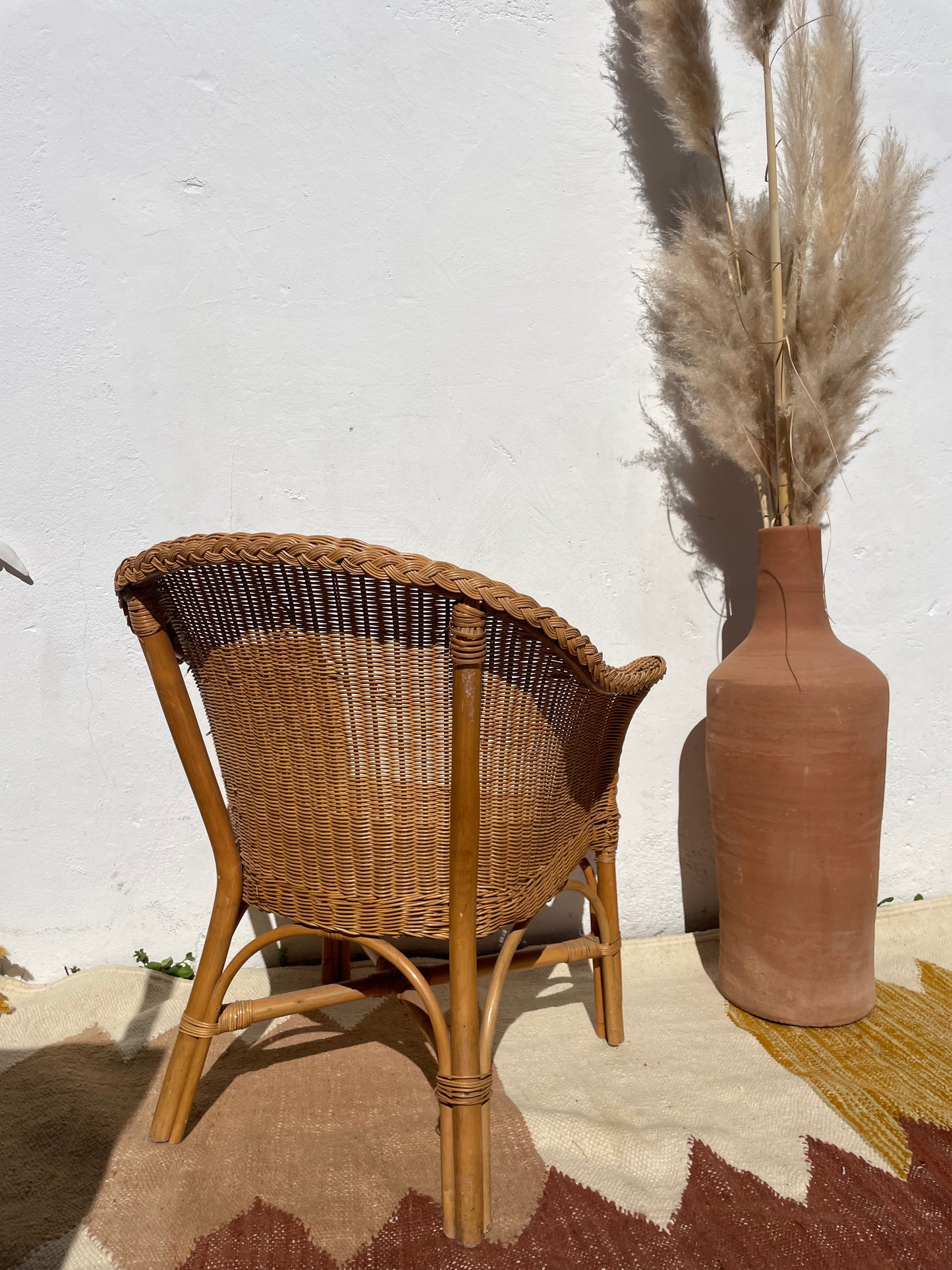 Fauteuil vintage en rotin tressé – esprit bohème