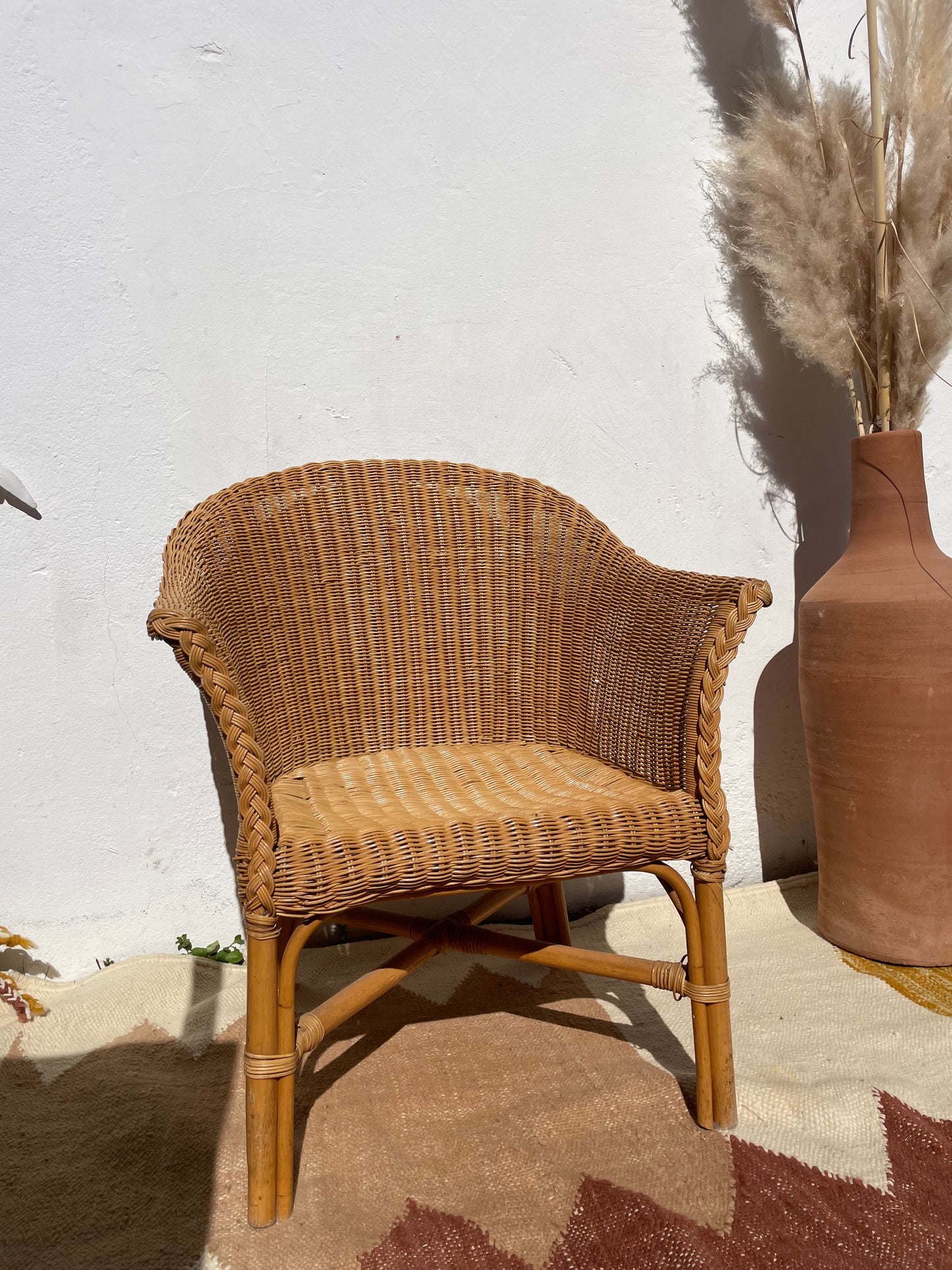 Fauteuil vintage en rotin tressé – esprit bohème